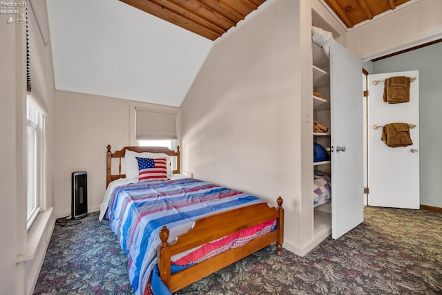 bedroom featuring wooden ceiling and lofted ceiling