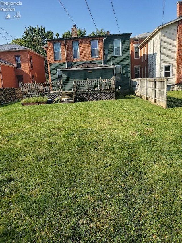 view of yard featuring a deck