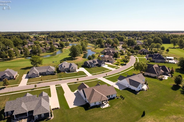 aerial view with a residential view and a water view