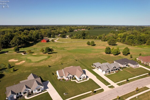 drone / aerial view with a view of trees