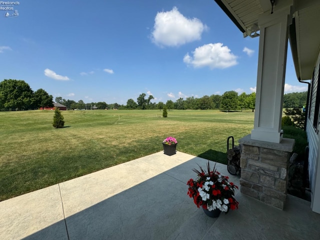 view of patio with a rural view