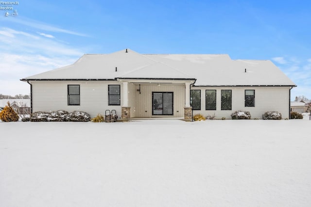 view of snow covered property