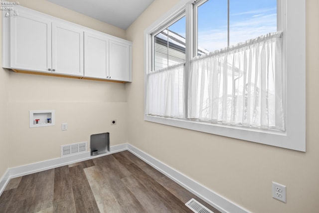 laundry area featuring visible vents, baseboards, hookup for an electric dryer, hookup for a washing machine, and dark wood-style flooring