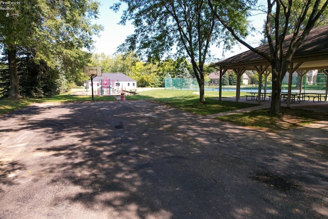 view of street with aphalt driveway