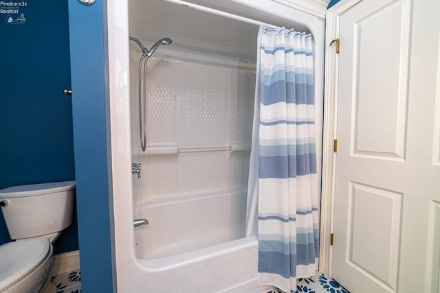 bathroom with toilet and shower / bath combo