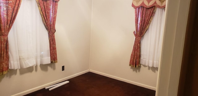 unfurnished room with carpet flooring