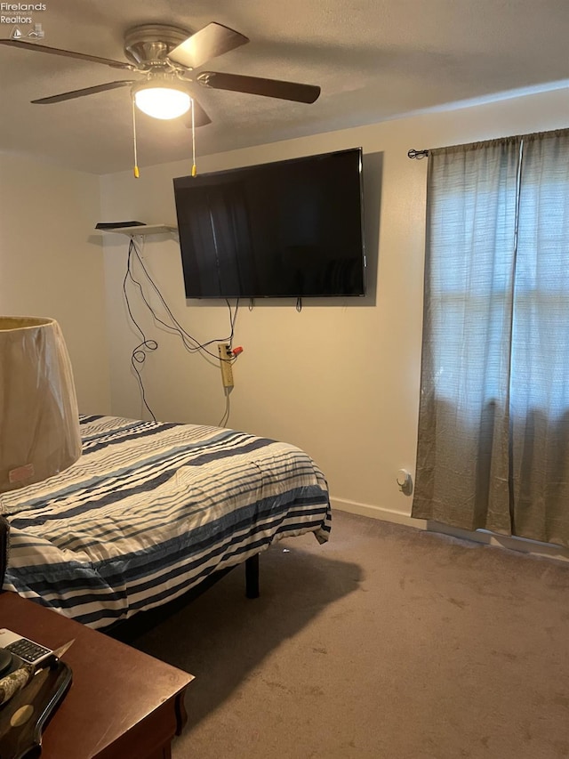 bedroom featuring carpet and ceiling fan