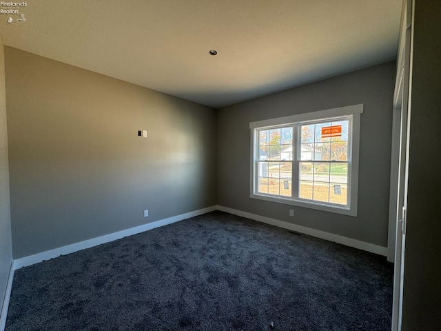 view of carpeted spare room