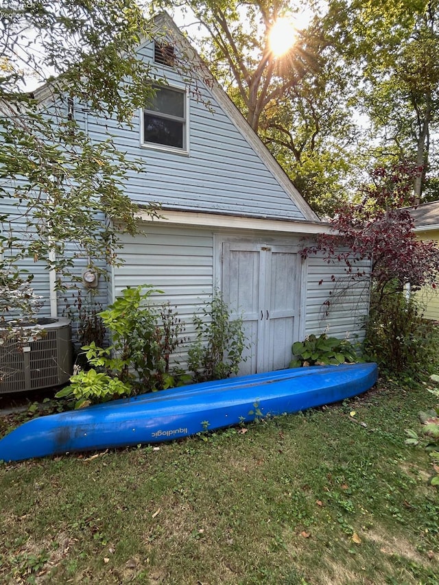 exterior space featuring central AC unit