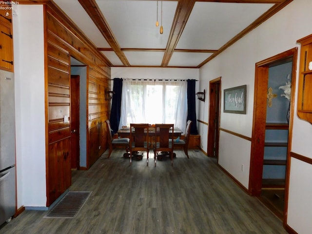 dining room featuring dark wood-type flooring and coffered ceiling