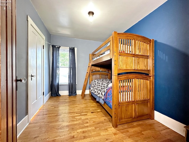 bedroom with light wood-type flooring