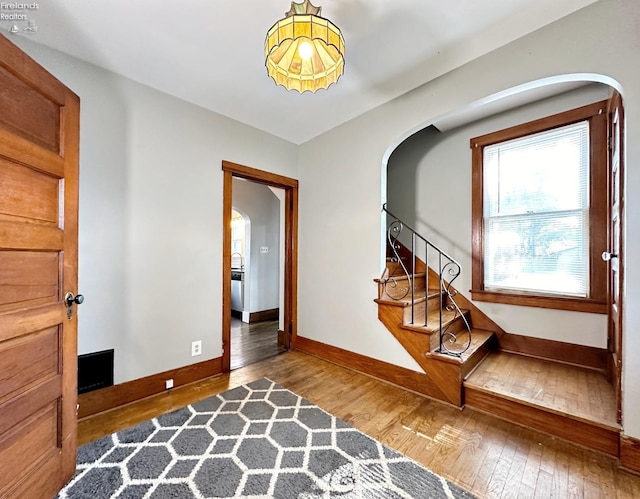 foyer featuring hardwood / wood-style floors