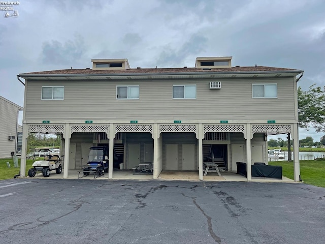 view of building exterior with a carport