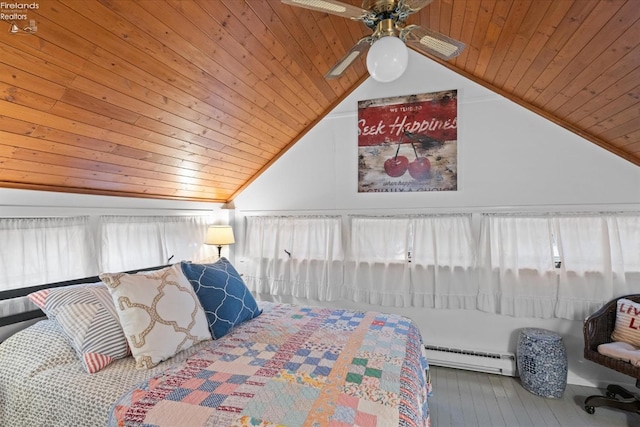 bedroom with wood ceiling, vaulted ceiling, and multiple windows