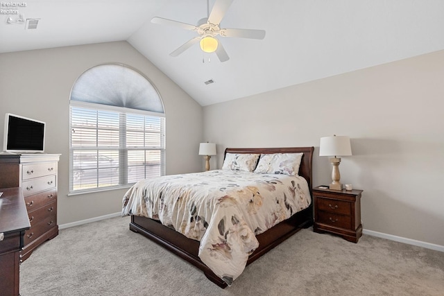 bedroom featuring light colored carpet, ceiling fan, and vaulted ceiling