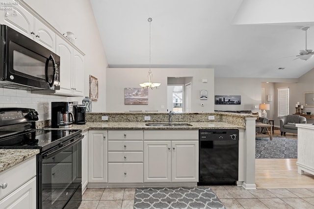 kitchen with white cabinets, light hardwood / wood-style flooring, sink, black appliances, and ceiling fan