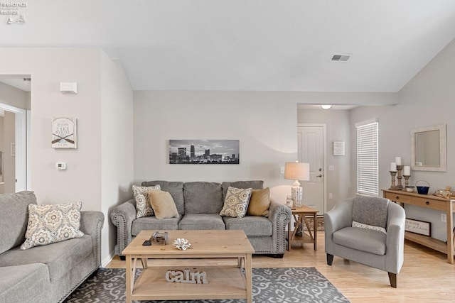 living room with light hardwood / wood-style floors