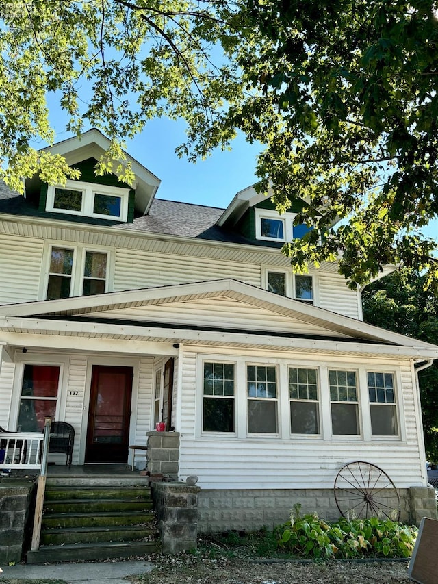 view of front of property featuring covered porch