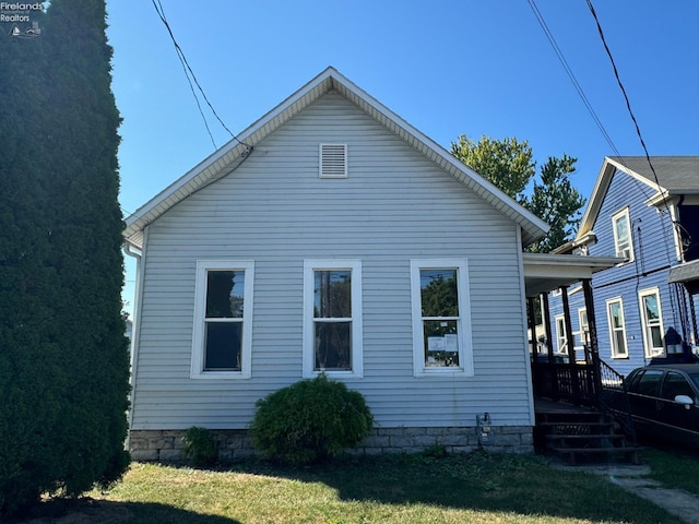 exterior space with a yard