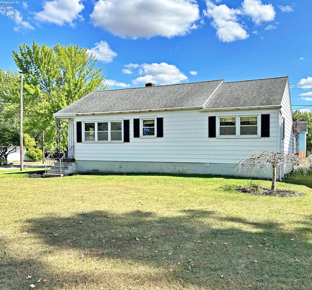 view of front of house with a front yard