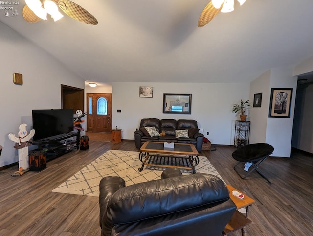 living room featuring lofted ceiling, ceiling fan, and hardwood / wood-style flooring