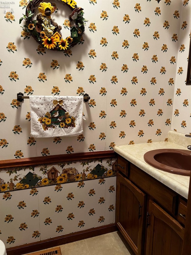 bathroom with vanity and tile patterned floors