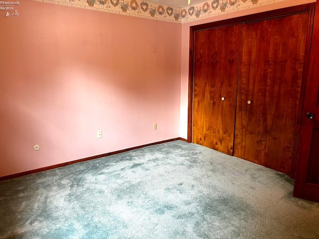 unfurnished bedroom featuring carpet flooring