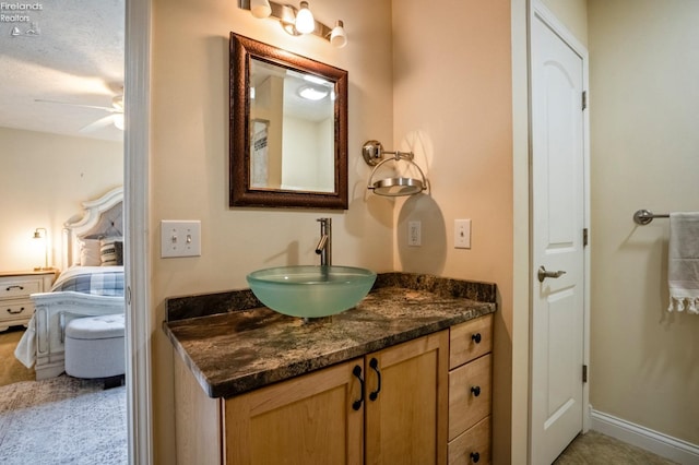 bathroom with vanity and ceiling fan