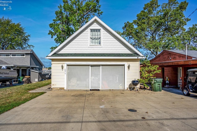 garage featuring a carport