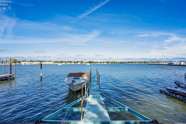 view of dock featuring a water view