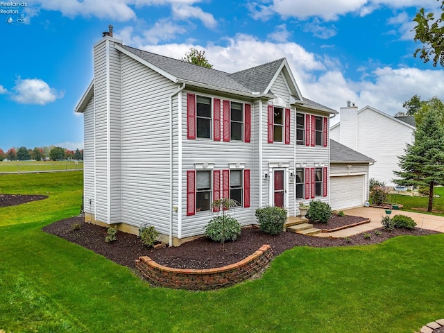 colonial inspired home with a front yard