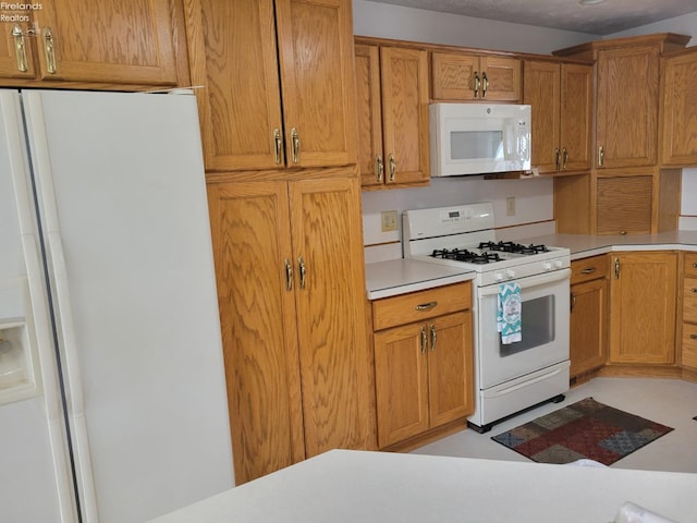 kitchen featuring white appliances