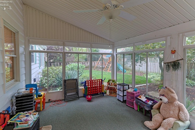 sunroom / solarium featuring vaulted ceiling and ceiling fan