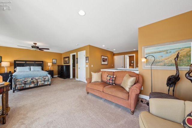 bedroom with light carpet and ceiling fan