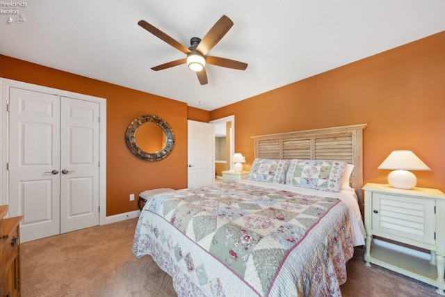 bedroom featuring a closet, carpet, and ceiling fan