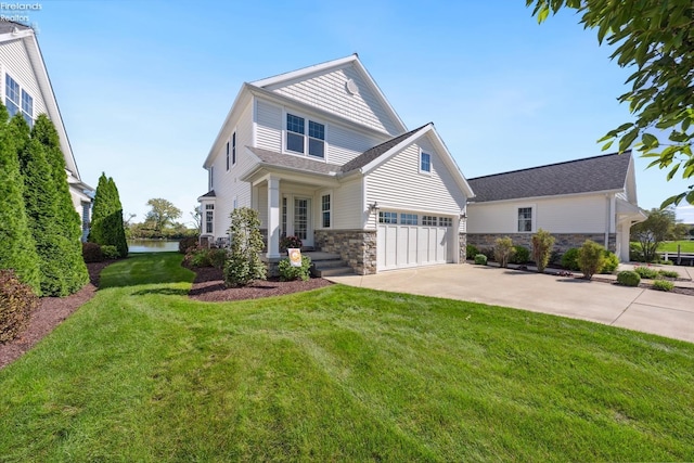 craftsman-style home featuring a front lawn and a garage