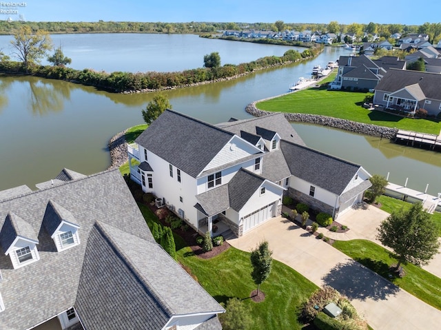 drone / aerial view featuring a water view