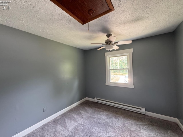 carpeted spare room featuring a textured ceiling, a baseboard radiator, and ceiling fan