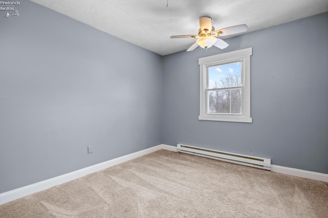 spare room with baseboard heating, ceiling fan, carpet flooring, and a textured ceiling