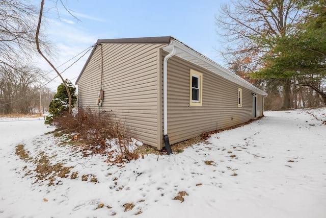 view of snow covered property