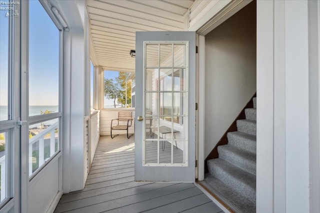 218 Lakefront, Lakeside, OH 43440 - unfurnished sunroom featuring a water view