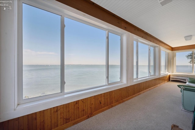 218 Lakefront, Lakeside, OH 43440 - sunroom / solarium featuring carpet flooring, wood walls, and a water view