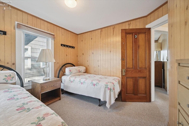218 Lakefront, Lakeside, OH 43440 - carpeted bedroom featuring wood walls and crown molding