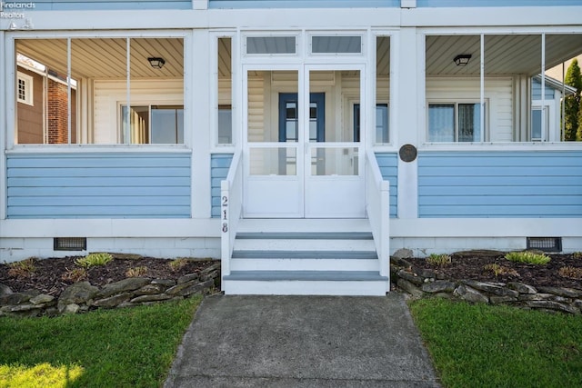 property entrance with a porch