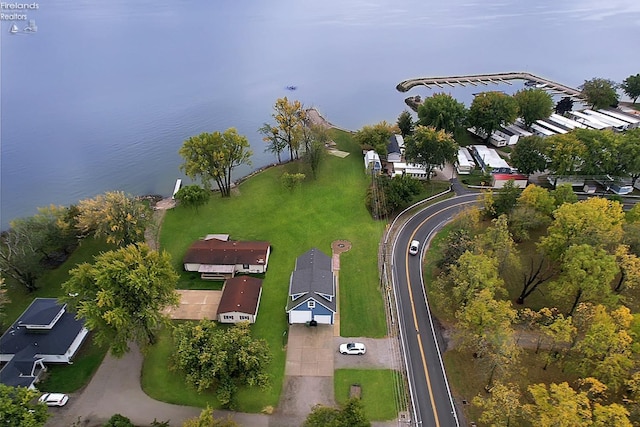 birds eye view of property featuring a water view