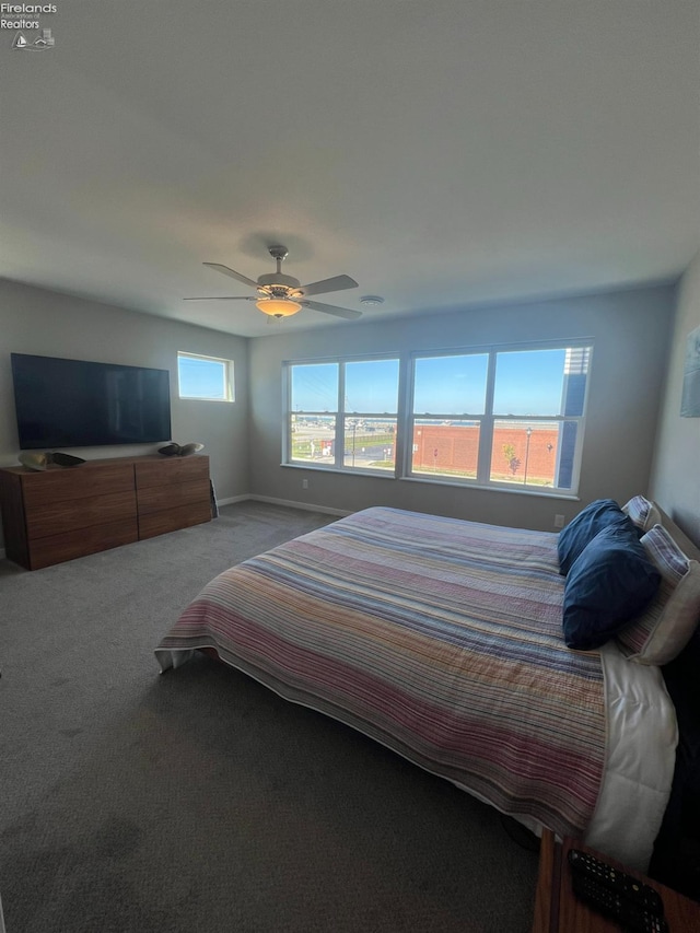 bedroom featuring ceiling fan and carpet flooring