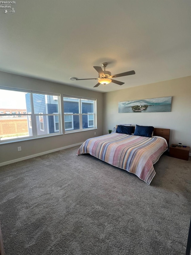 bedroom featuring ceiling fan and carpet flooring