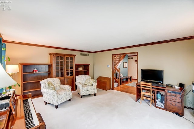 living room featuring crown molding and carpet