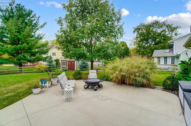 view of patio with an outdoor fire pit