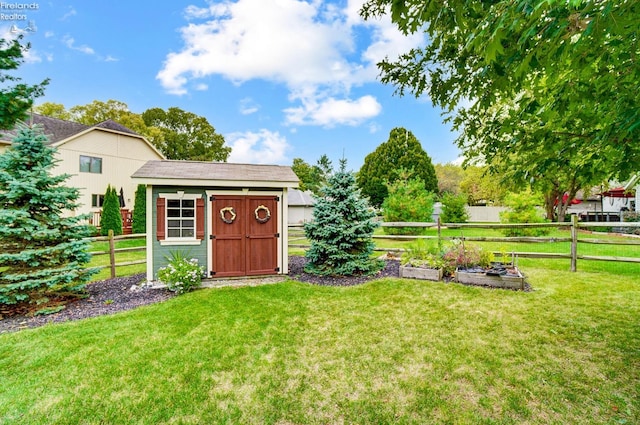 view of outbuilding featuring a lawn